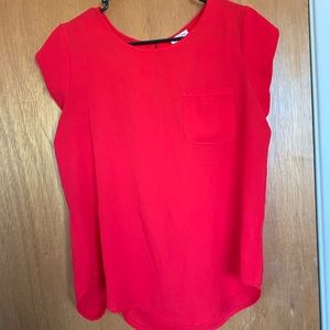 Loose red blouse